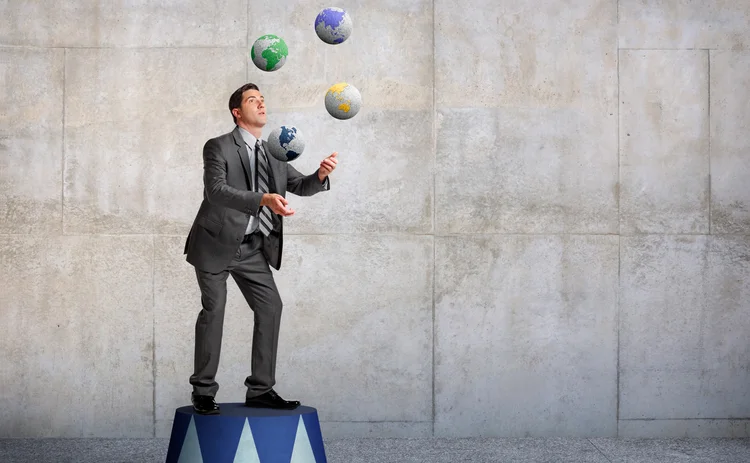  businessman juggling - Getty.jpg 